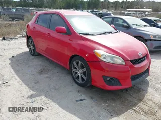 2009 Toyota Matrix S z VIN 2T1KE40E29C026440, wystawiony jako IAAI lot #41718124 z przebiegiem 148 546 mil mil oraz . Historia ofert i sprzedaży dostępna na DreamBid. Obrazek 1.