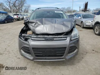 2013 Ford Escape Titanium z VIN 1FMCU9J90DUA72264, wystawiony jako Copart lot #49906445 z przebiegiem 126 527 mil mil oraz Szkoda całkowita • Salvage title. Historia ofert i sprzedaży dostępna na DreamBid. Obrazek 5.