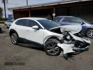 2021 Mazda CX-30 Select z VIN 3MVDMABL3MM239370, wystawiony jako Copart lot #49891555 z przebiegiem 43 217 mil mil oraz Szkoda całkowita • Salvage title. Historia ofert i sprzedaży dostępna na DreamBid. Obrazek 4.