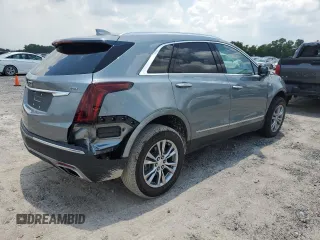 2023 Cadillac XT5 FWD Premium Luxury with VIN 1GYKNCRS3PZ135585, listed as a Copart auction lot 58891914 with 32,325 mi miles and Salvage Title. Bid and sale history available at carsss.com. Image 3.