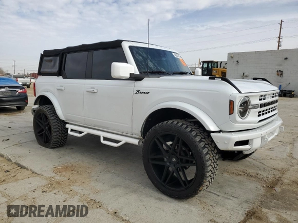 2021 Ford Bronco with VIN 1FMEE5BH5MLB03650, listed as a Copart auction lot 43584385 with 12,104 mi miles and Salvage Title. Bid and sale history available at DreamBid. Image 4.