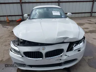 2014 BMW Z4 sDrive35i with VIN WBALM7C58EE386241, listed as a IAAI auction lot 41694078 with 66,884 mi miles. Bid and sale history available at carsss.com. Image 6.