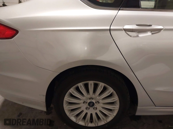 2015 Ford Fusion SE Hybrid with VIN 3FA6P0LU7FR266702, listed as a IAAI auction lot 41390791 with 94,465 mi miles. Bid and sale history available at carsss.com. Image 19.