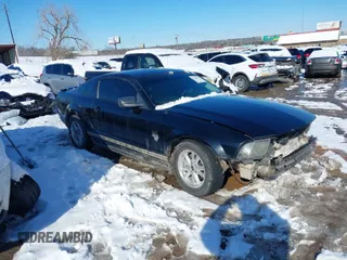2009 Ford Mustang with VIN 1ZVHT80N195136459, listed as a IAAI auction lot 41284704 with 157,676 mi miles and . Bid and sale history available at carsss.com. Image 1.