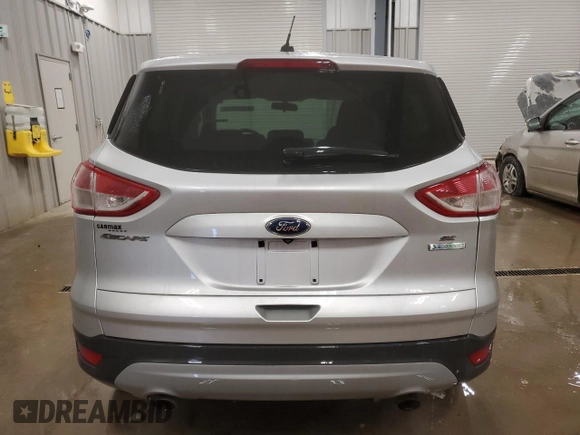 2014 Ford Escape SE with VIN 1FMCU0GX7EUD32727, listed as a Copart auction lot 44636225 with 133,296 mi miles and Salvage Title. Bid and sale history available at carsss.com. Image 6.