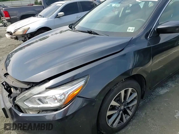 2017 Nissan Altima SV z VIN 1N4AL3AP3HC195276, wystawiony jako Copart lot #54894835 z przebiegiem 163 453 mil mil oraz Szkoda całkowita • Salvage title. Historia ofert i sprzedaży dostępna na DreamBid. Obrazek 14.