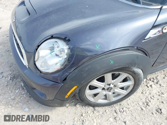 2013 MINI Coupe S with VIN WMWSX3C50DT466882, listed as a IAAI auction lot 42026938 with 99,499 mi miles and . Bid and sale history available at DreamBid. Image 6.