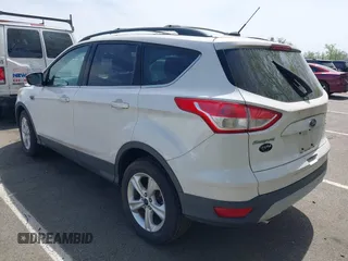 2013 Ford Escape SE with VIN 1FMCU9GXXDUD63179, listed as a IAAI auction lot 42017993 with 72,410 mi miles. Bid and sale history available at carsss.com. Image 3.
