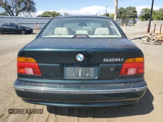 2000 BMW 5 Series 528iA with VIN WBADM6345YGU18707, listed as a Copart auction lot 63293814 with 0 mi miles and Salvage Title. Bid and sale history available at carsss.com. Image 6.