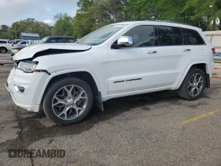 2019 Jeep Grand Cherokee Overland with VIN 1C4RJECG4KC833019, listed as a Copart auction lot 51277555 with 124,072 mi miles and Salvage Title. Bid and sale history available at carsss.com. Image 1.
