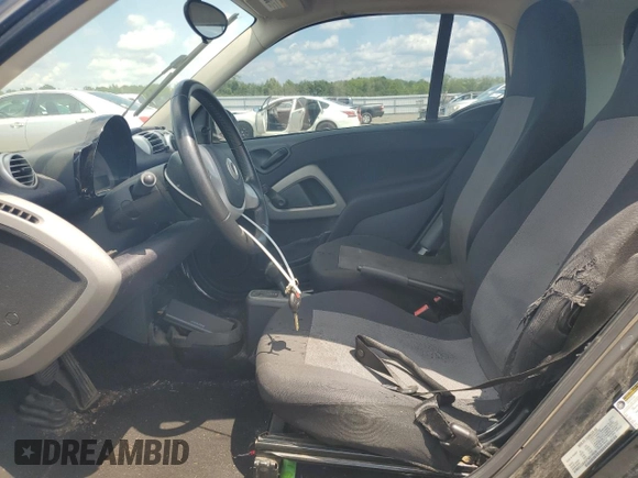 2015 Smart fortwo Passion with VIN WMEEJ3BA6FK819930, listed as a Copart auction lot 64722495 with 106,124 mi miles and Clean title. Bid and sale history available at DreamBid. Image 7.