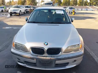 2003 BMW 3 Series 330i with VIN WBAEV53463KM29698, listed as a IAAI auction lot 41528947 with 204,400 mi miles. Bid and sale history available at carsss.com. Image 6.