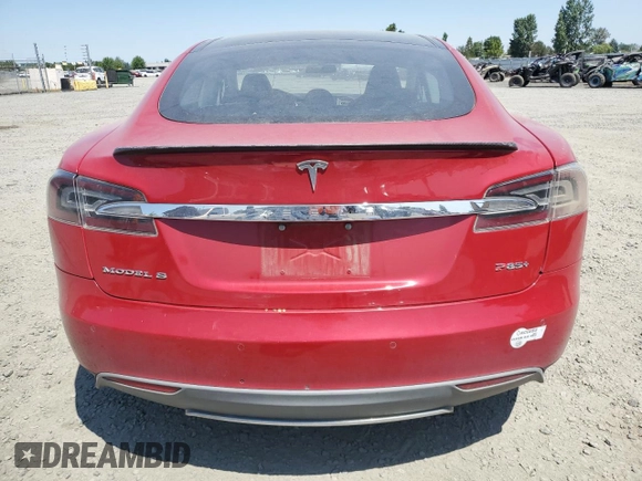 2014 Tesla Model S 60 with VIN 5YJSA1H17EFP29100, listed as a Copart auction lot 65081725 with 130,377 mi miles and Clean title. Bid and sale history available at DreamBid. Image 6.