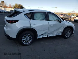 2023 Mazda CX-5 2.5 S with VIN JM3KFBAM6P0269481, listed as a Copart auction lot 87222194 with 21,070 mi miles and Salvage Title. Bid and sale history available at carsss.com. Image 3.
