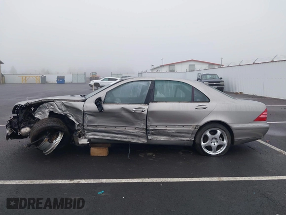 2004 Mercedes-Benz S-Class 5.0L with VIN WDBNG84J24A404189, listed as a IAAI auction lot 41337556 with 142,962 mi miles. Bid and sale history available at carsss.com. Image 15.