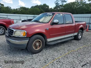 2001 Ford F-150 XLT with VIN 1FTRW07LX1KD65474, listed as a Copart auction lot 61474655 with 361,023 mi miles and Salvage title. Bid and sale history available at DreamBid. Image 1.
