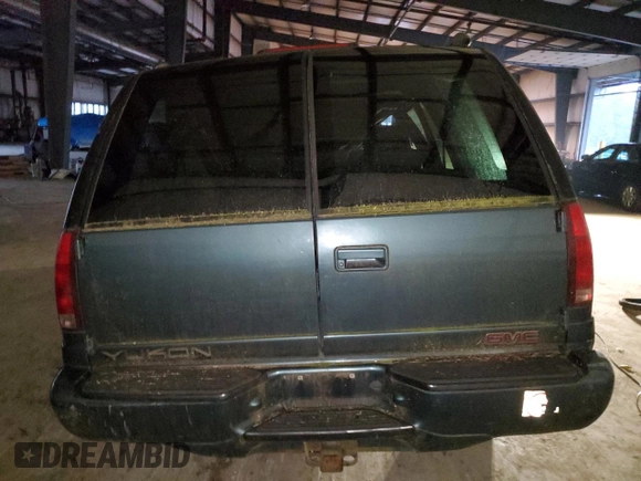 1999 GMC Denali z VIN 1GKEK13R5XR918465, wystawiony jako Copart lot #83269184 z przebiegiem Nie podano mil oraz Nie do naprawy. Historia ofert i sprzedaży dostępna na DreamBid. Obrazek 6.