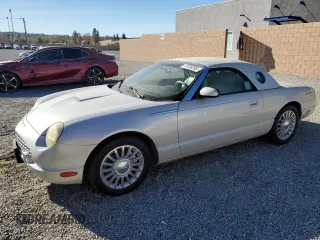 2005 Ford Thunderbird 50th Anniversary with VIN 1FAHP69A85Y106689, listed as a Copart auction lot 41338295 with 104,128 mi miles and Clean Title. Bid and sale history available at DreamBid. Image 1.