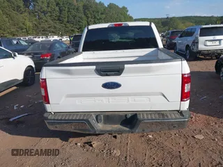 2018 Ford F-150 XL with VIN 1FTEW1E55JKF29898, listed as a IAAI auction lot 40593129 with 158,663 mi miles and . Bid and sale history available at carsss.com. Image 16.