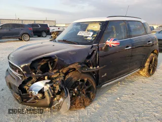 2015 MINI Countryman S with VIN WMWZC5C57FWP48606, listed as a Copart auction lot 47212255 with 104,922 mi miles and Salvage Title. Bid and sale history available at DreamBid. Image 1.