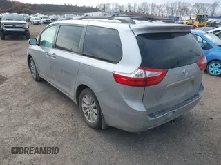 2015 Toyota Sienna Limited with VIN 5TDDK3DC6FS111465, listed as a IAAI auction lot 41698574 with 195,553 mi miles and . Bid and sale history available at DreamBid. Image 3.
