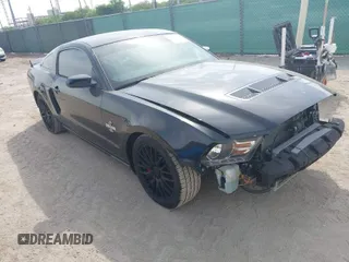 2010 Ford Mustang GT500 with VIN 1ZVBP8JS9A5130203, listed as a IAAI auction lot 42064720 with 32,461 mi miles. Bid and sale history available at carsss.com. Image 1.