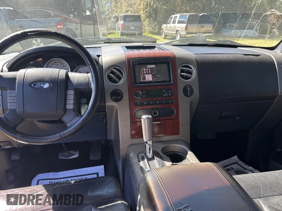 2005 Ford F-150 XLT with VIN 1FTPW12575KE12987, listed as a Copart auction lot 48539135 with 217,115 mi miles and Salvage Title. Bid and sale history available at carsss.com. Image 9.