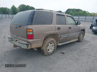 2004 Chevrolet Tahoe LT with VIN 1GNEC13Z04R126543, listed as a IAAI auction lot 42059836 with 252,773 mi miles. Bid and sale history available at carsss.com. Image 4.