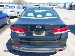 2016 Kia Optima LX with VIN 5XXGT4L3XGG013835, listed as a IAAI auction lot 41815349 with 120,628 mi miles and . Bid and sale history available at carsss.com. Image 16.