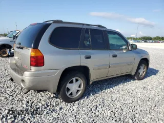 2003 GMC Envoy SLT z VIN 1GKDS13S032373020, wystawiony jako Copart lot #54986765 z przebiegiem 235 711 mil mil oraz Tytuł czysty. Historia ofert i sprzedaży dostępna na DreamBid. Obrazek 3.