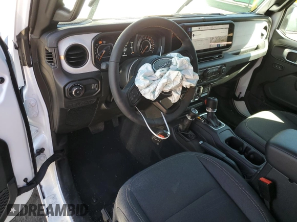 2024 Jeep Wrangler Sport S with VIN 1C4PJXAG1RW349260, listed as a Copart auction lot 60270065 with 5,575 mi miles and Salvage title. Bid and sale history available at DreamBid. Image 8.