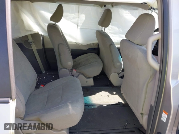 2015 Toyota Sienna L with VIN 5TDZK3DC4FS669496, listed as a IAAI auction lot 41691430 with 119,427 mi miles and . Bid and sale history available at DreamBid. Image 8.