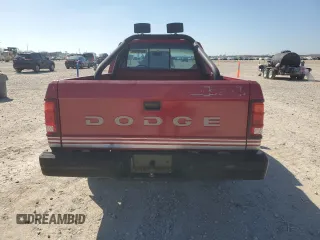 1989 Dodge Dakota z VIN 1B7GG66X6KS127702, wystawiony jako Copart lot #43276685 z przebiegiem 121 862 mil mil oraz Czysty tytuł • Clean title. Historia ofert i sprzedaży dostępna na DreamBid. Obrazek 6.