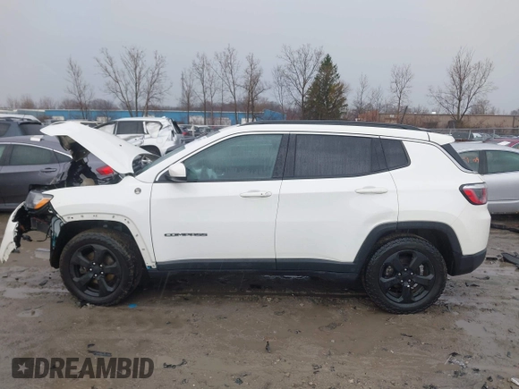 2019 Jeep Compass Latitude with VIN 3C4NJCBB4KT778018, listed as a IAAI auction lot 41900231 with 102,651 mi miles and . Bid and sale history available at carsss.com. Image 14.