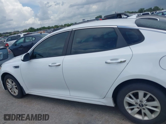 2018 Kia Optima S with VIN 5XXGT4L32JG184893, listed as a IAAI auction lot 42680521 with 55,225 mi miles and . Bid and sale history available at DreamBid. Image 14.