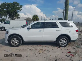 2013 Dodge Durango Crew with VIN 1C4RDHDGXDC608209, listed as a IAAI auction lot 42779231 with 203,460 mi miles and . Bid and sale history available at DreamBid. Image 14.