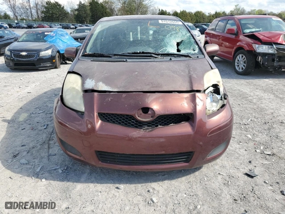 2009 Toyota Yaris with VIN JTDKT903095229132, listed as a Copart auction lot 51512655 with 183,963 mi miles and Salvage Title. Bid and sale history available at carsss.com. Image 5.