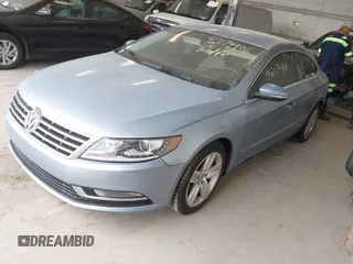 2013 Volkswagen CC Sport with VIN WVWBP7AN1DE567561, listed as a IAAI auction lot 42174906 with 157,827 mi miles. Bid and sale history available at carsss.com. Image 2.