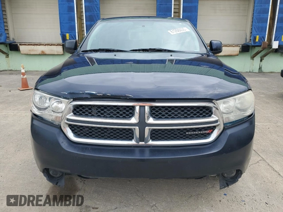 2012 Dodge Durango SXT z VIN 1C4RDJAG5CC322147, wystawiony jako Copart lot #61288635 z przebiegiem 297 224 mil mil oraz Czysty tytuł • Clean title. Historia ofert i sprzedaży dostępna na DreamBid. Obrazek 5.