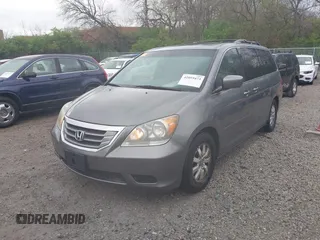2009 Honda Odyssey EX-L with VIN 5FNRL38649B028066, listed as a IAAI auction lot 42059473 with 193,122 mi miles. Bid and sale history available at carsss.com. Image 2.