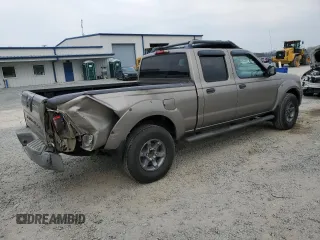 2004 Nissan Frontier XE with VIN 1N6ED29X64C478172, listed as a Copart auction lot 49031985 with 210,354 mi miles and Salvage title. Bid and sale history available at DreamBid. Image 3.