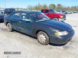 1999 Mazda 626 ES with VIN 1YVGF22C2X5859646, listed as a IAAI auction lot 41887343 with 1 mi miles. Bid and sale history available at carsss.com. Image 1.