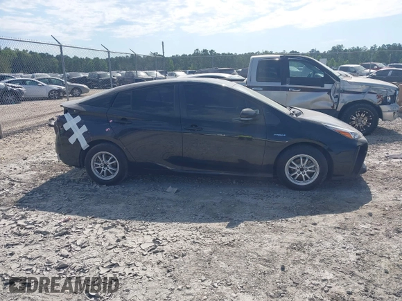 2021 Toyota Prius L Eco with VIN JTDKAMFU6M3141392, listed as a IAAI auction lot 42317866 with 137,495 mi miles and . Bid and sale history available at DreamBid. Image 12.