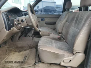 1999 Toyota Tacoma with VIN 4TAVL52N8XZ561633, listed as a Copart auction lot 65270545 with 175,223 mi miles and Clean title. Bid and sale history available at DreamBid. Image 7.