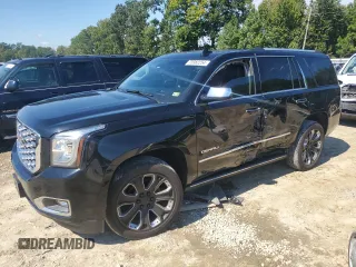 2019 GMC Yukon Denali with VIN 1GKS2CKJXKR206455, listed as a Copart auction lot 73382254 with 146,763 mi miles and Salvage Title. Bid and sale history available at carsss.com. Image 1.