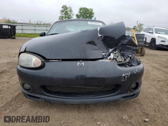1999 Mazda MX-5 Miata with VIN JM1NB3531X0102616, listed as a Copart auction lot 59779415 with 194,494 mi miles and Salvage title. Bid and sale history available at DreamBid. Image 5.