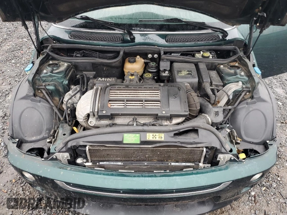 2008 MINI Convertible S z VIN WMWRH33518TU81148, wystawiony jako Copart lot #82677354 z przebiegiem 91 539 mil mil oraz Szkoda całkowita • Salvage title. Historia ofert i sprzedaży dostępna na DreamBid. Obrazek 11.