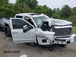 2017 GMC Sierra 2500HD Denali with VIN 1GT12UEG3HF117771, listed as a IAAI auction lot 42334696 with 140,999 mi miles and . Bid and sale history available at DreamBid. Image 1.