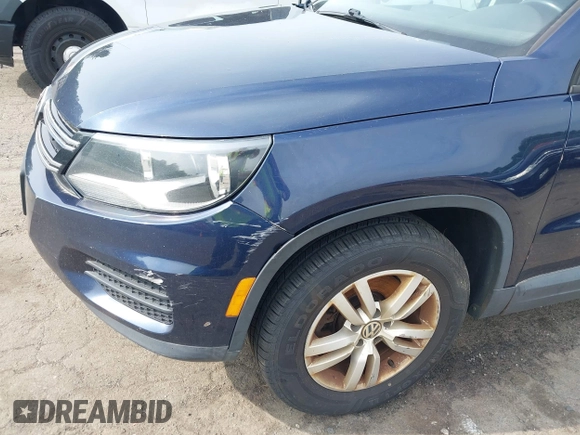 2015 Volkswagen Tiguan S z VIN WVGBV7AX8FW503114, wystawiony jako IAAI lot #42397033 z przebiegiem 200 658 mil mil oraz . Historia ofert i sprzedaży dostępna na DreamBid. Obrazek 18.