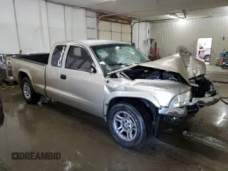 2003 Dodge Dakota SLT z VIN 1D7HL42N63S132141, wystawiony jako Copart lot #56138235 z przebiegiem 219 246 mil mil oraz Szkoda całkowita • Salvage title. Historia ofert i sprzedaży dostępna na DreamBid. Obrazek 4.